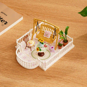 Rolife Super Creator Extension Pack - Sunny Break Terrace miniature with swing and flowers.