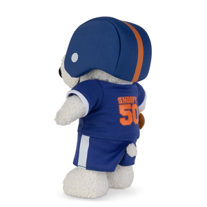 Bon Ton Toys Peanuts American Football Snoopy plush toy in a blue football outfit and helmet, side view.