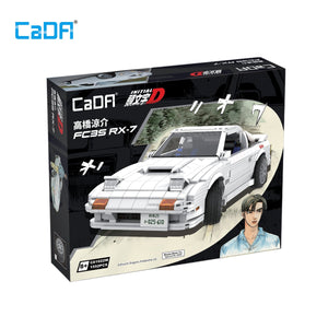 CaDA FC3S RX-7 model car kit packaging with a white car illustration on a black background
