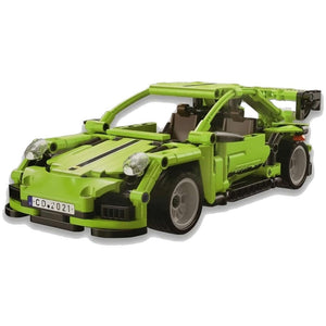 Green toy car model on a white background