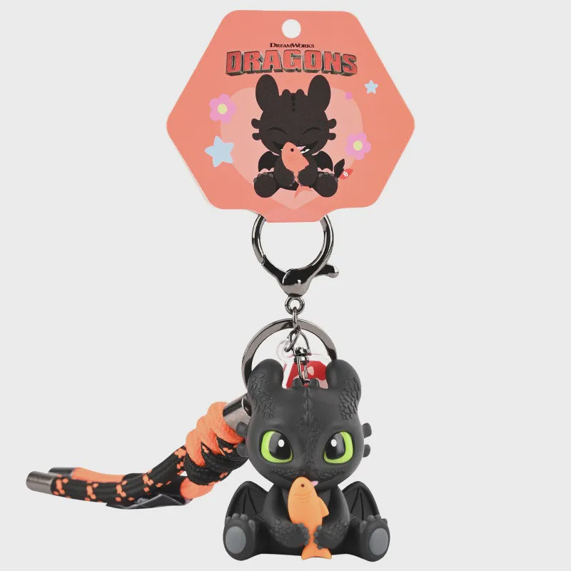 How to Train Your Dragon Toothless Holding Fish Light-Up Eyes Keychain