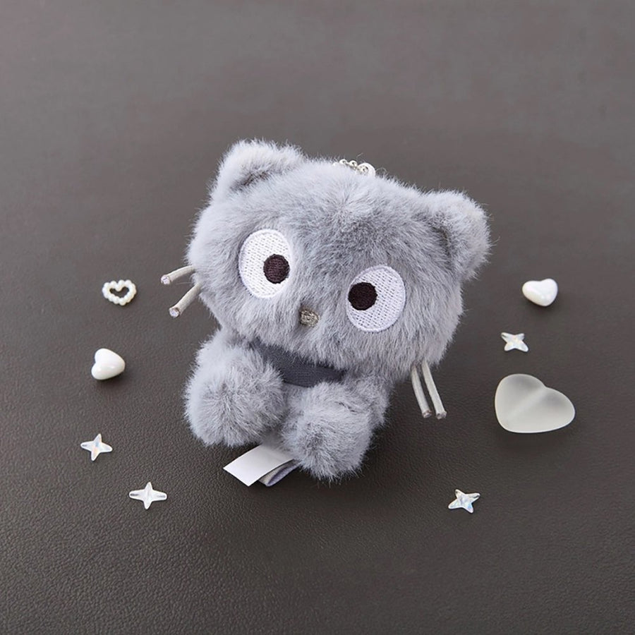 Sanrio Chococat Monochrome Plush Mascot Keychain Charm featuring a soft grey-toned design on a flat surface.