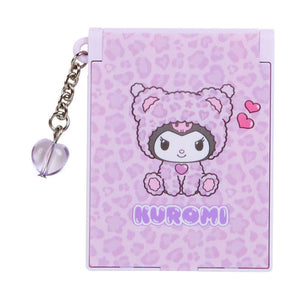 Purple notebook with a character design and 'Kuromi' branding, featuring a keychain attachment.