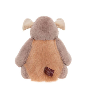 Plush toy with a tag on a white background
