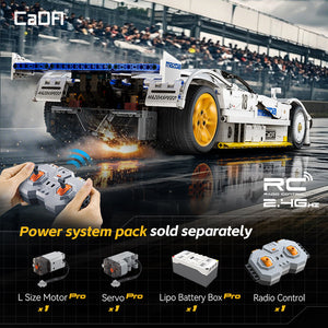 Model race car with remote control and power system pack components on a racetrack background.