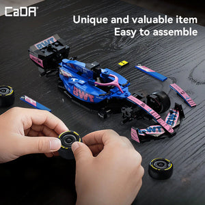 CaDA 1:24 Alpine F1 A525 Brick Model Kits being assembled, showcasing detailed design and vibrant colors.