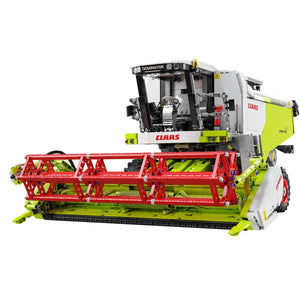Model of a combine harvester with red and green colors on a white background