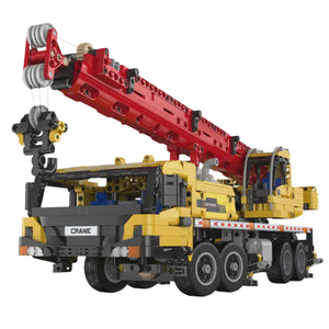 Toy crane model on a white background