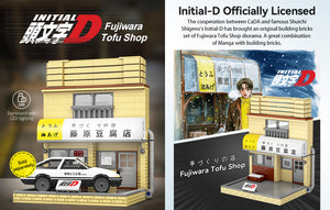 Model of a tofu shop with a car in front, inspired by 'Initial D' series, featuring Fujiwara Tofu Shop.