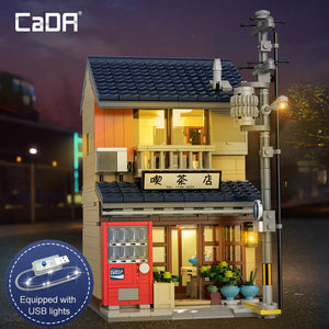 Model of a Japanese-style building with USB light feature, brand 'CaDA' visible.