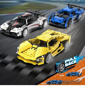 Toy cars, including a yellow, blue, and white model, on a racetrack with 'BRICKMO' branding.