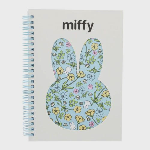 Notebook with floral design and 'miffy' branding on a white background