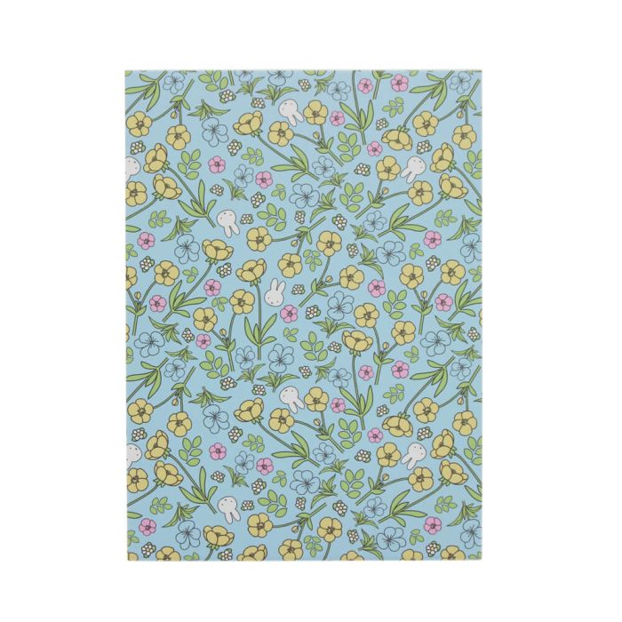 Floral patterned paper with colorful flowers on a blue background