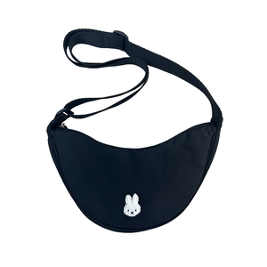 Black waist bag with a small white bunny design on a white background