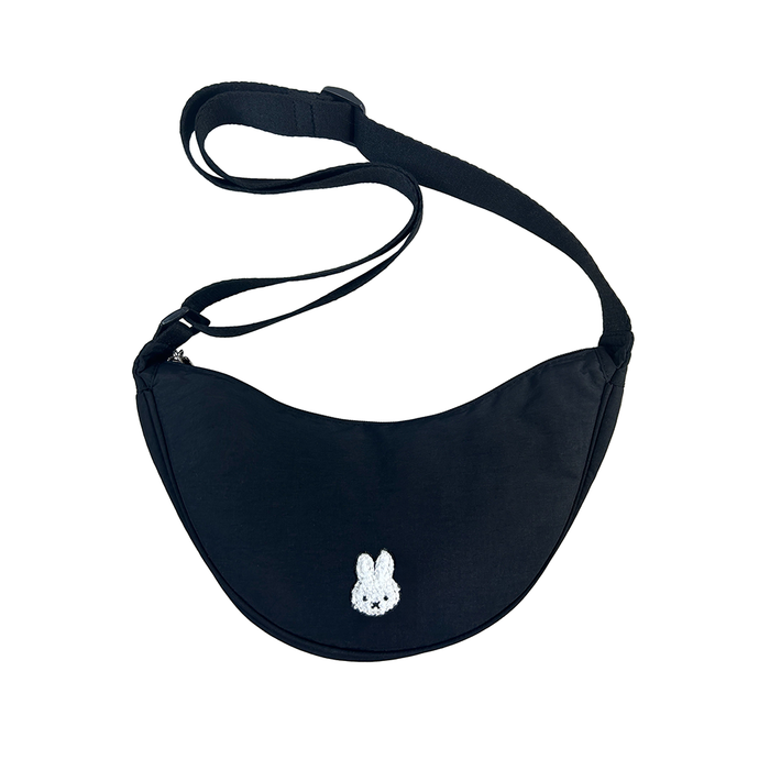 Black waist bag with a small white bunny design on a white background