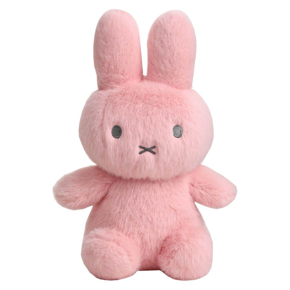 Pink plush toy with a sad expression on a white background