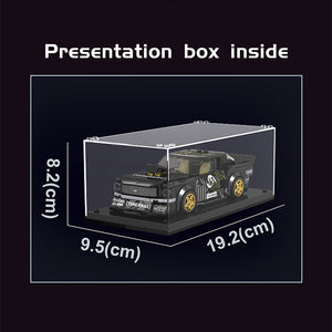 Model car inside a clear display box with dimensions on a black background