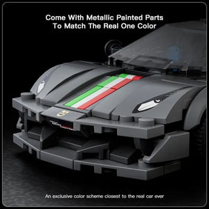 Toy car model with metallic painted parts on a dark background