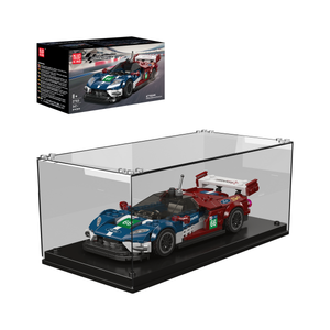Model racing car in a clear display case with packaging in the background