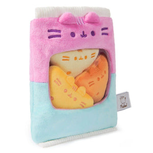 Plush toy with a pink and blue design featuring cartoon characters on a white background