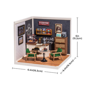 Miniature coffee shop model with furniture and decor, including dimensions displayed.