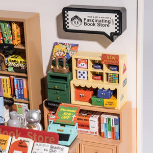 Toy bookshelf with various toy books and items, labeled 'Fascinating Book Store'.