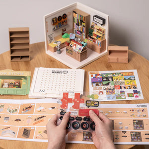 Miniature model of a store with accessories on a table