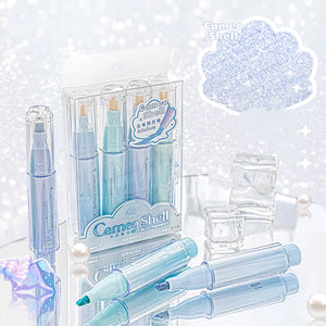 Set of light blue cosmetic products with 'Cameo Shell' packaging on a sparkling background.