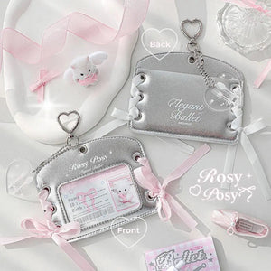 Silver keychains with pink ribbons and 'Rosy Posy' branding on a light gray background.