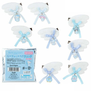 Set of hair clips with cloud design and small character charm, packaging visible.