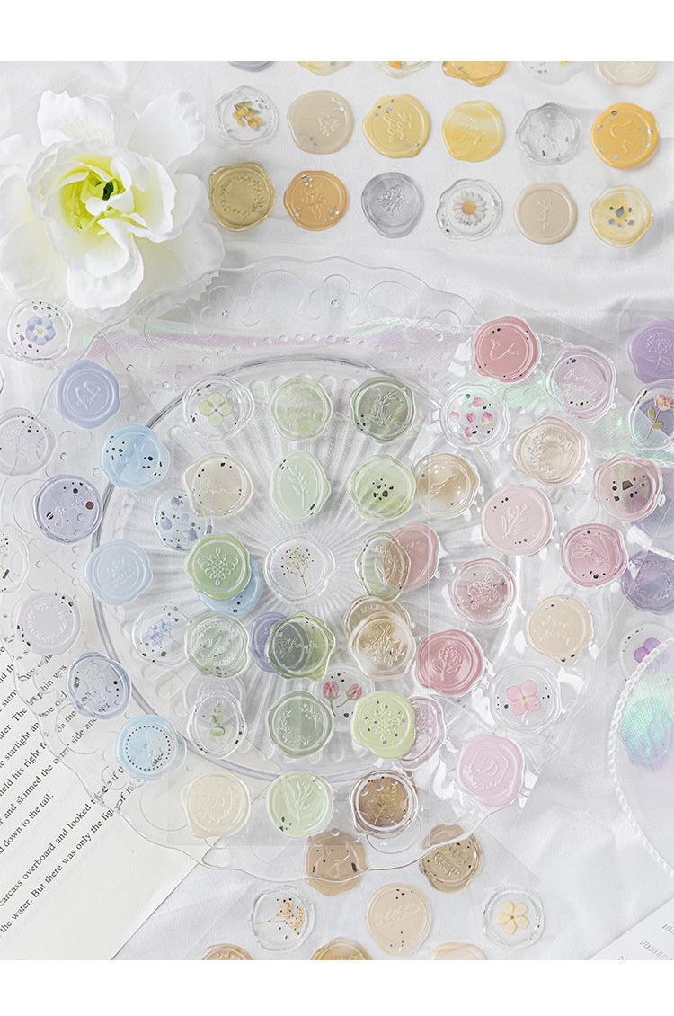 Set of small round containers with colorful contents on a white background