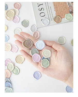 Sealing Dear Convex Crystal Candy Paint Wax Seal Stickers - Asorted in hand with colorful pastel designs.