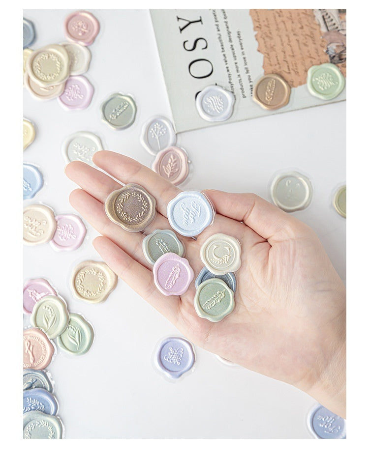 Sealing Dear Convex Crystal Candy Paint Wax Seal Stickers - Asorted in hand with colorful pastel designs.
