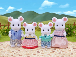 Four mouse figurines in a row with a scenic background