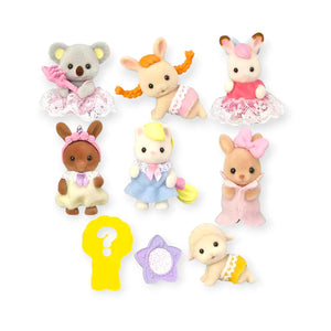 Set of small animal figurines with accessories on a white background