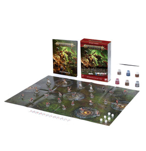 Warhammer Age of Sigmar Introductory Set featuring game components, handbook, miniatures, and paints on a game board.