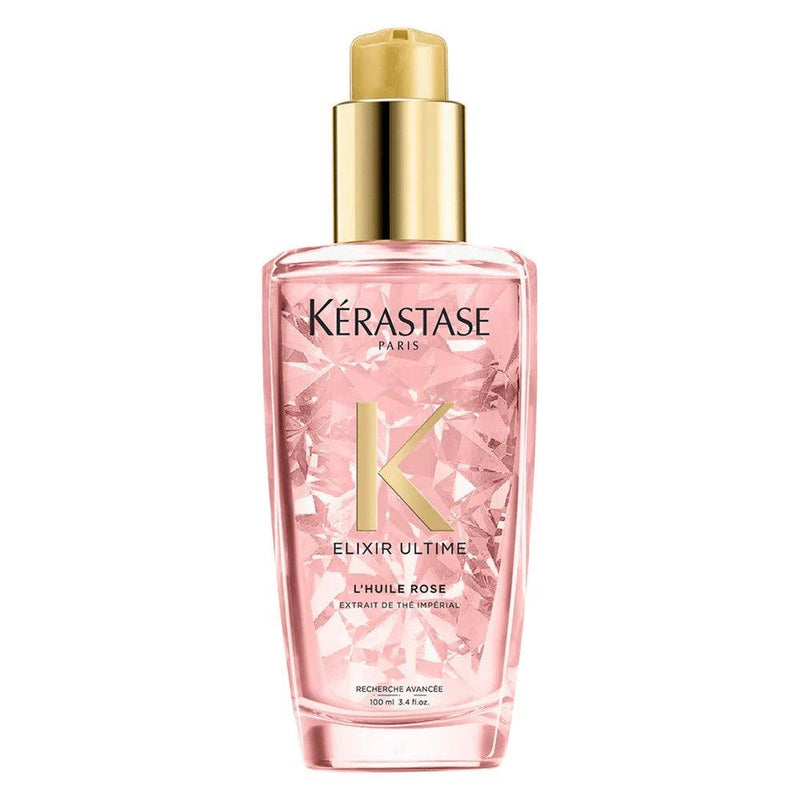 Kerastase Elixir Ultime L'Huile Rose hair oil in clear bottle with gold cap for nourished, radiant hair.