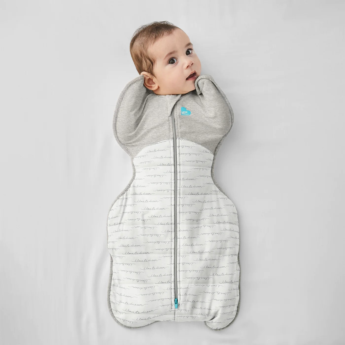 Comfortable Love To Dream swaddle with arms up design.