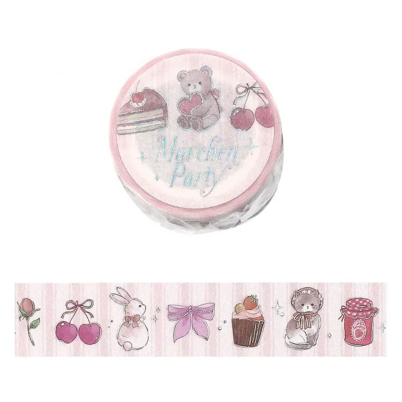 A roll of decorative washi tape with a pink striped background and cute illustrations, shown with a sample strip unrolled below. The design includes a teddy bear with a heart, cherries, a cake slice, a rabbit, a bow, a cupcake, and a teddy bear sitting on the right.
