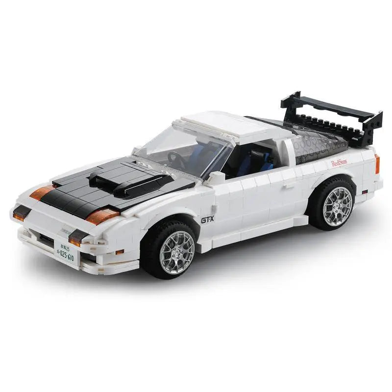 Model car made of building blocks on a white background