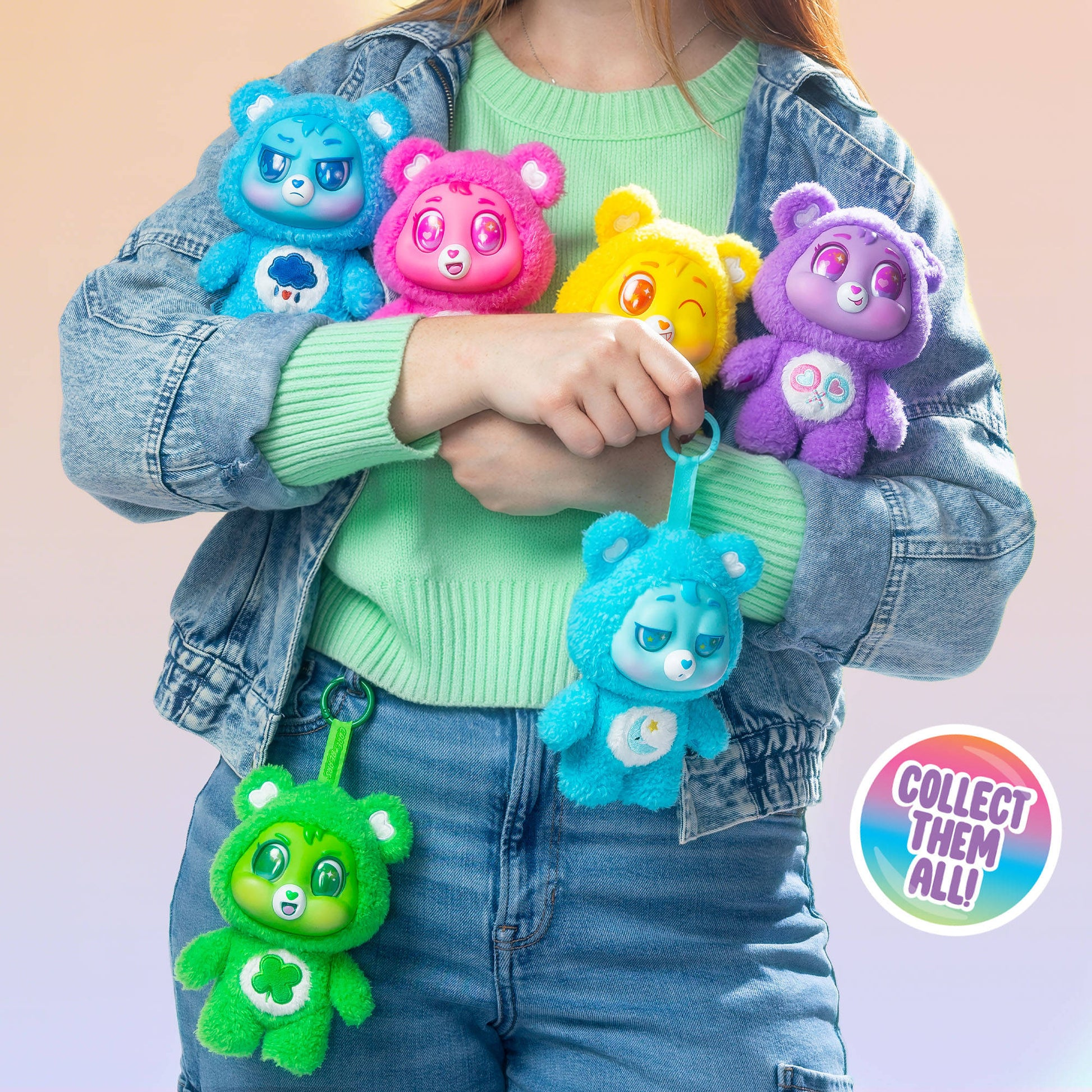 A collection of Care Bears Caring Cuties Plush Clips in various colors featuring cute designs and expressive faces.