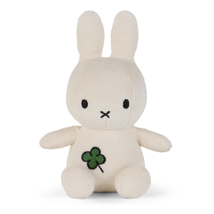 Miffy Four Leaf Clover Offwhite plush toy holding a green four-leaf clover, soft and charming for any room.