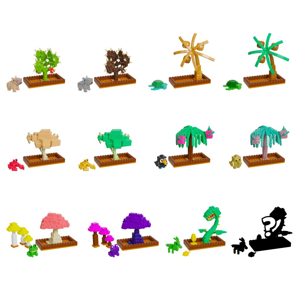 Collection of small toy trees and animals on a white background