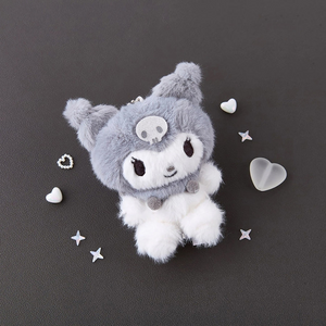 Sanrio Kuromi Monochrome Plush Mascot Keychain Charm on a dark surface with decorative hearts and stars.