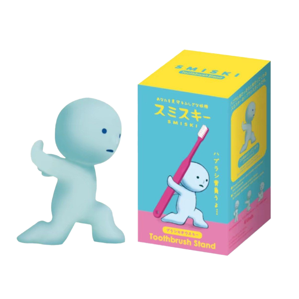 Blue figurine next to its packaging on a white background