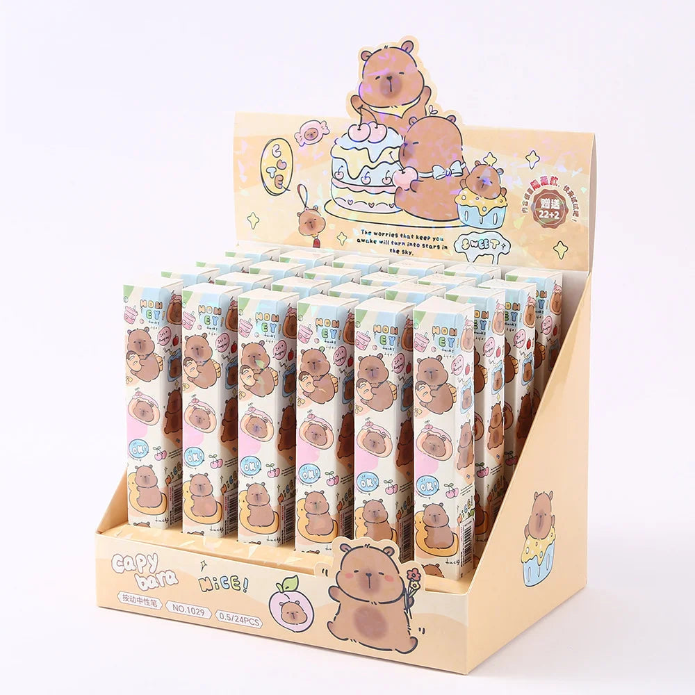 Display of cartoon bear-themed products in a decorative box on a white background