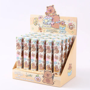 Display of cartoon bear-themed products in a decorative box on a white background