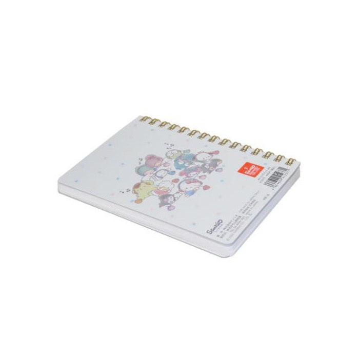 Small spiral-bound notebook with colorful illustrations on a white background