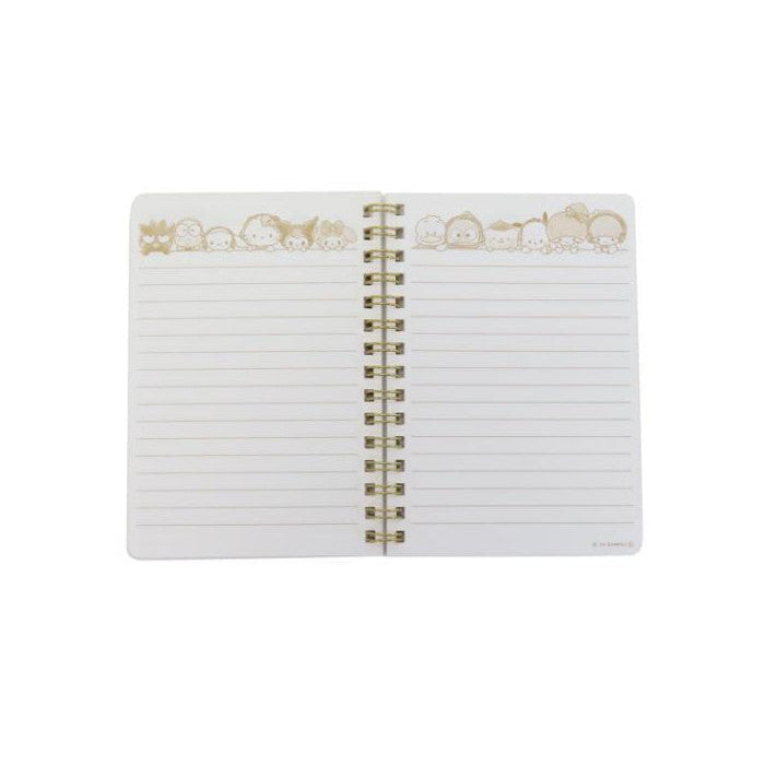 White notebook with gold trim on a white background