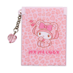 Pink notebook with 'My Melody' character and heart pattern on a white background